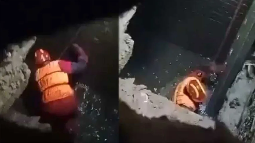 Body of Woman Found After Manhole Tragedy; Child Still Missing