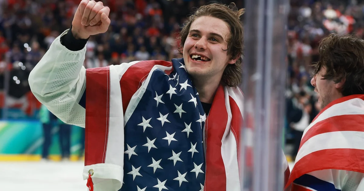 Photographer captures Jack Hughes’ toothy grin after Olympic victory