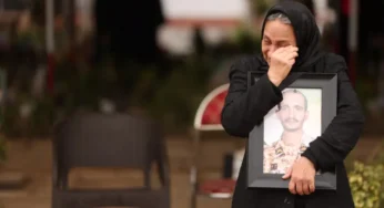 ‘When you burn our hearts, you do not stop us’: Iranian families bury war dead in Tehran cemetery