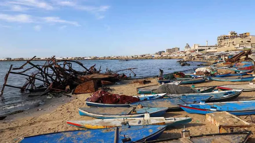 Gazan Fishermen Repair Vessels with Door Frames Amid Struggling Industry